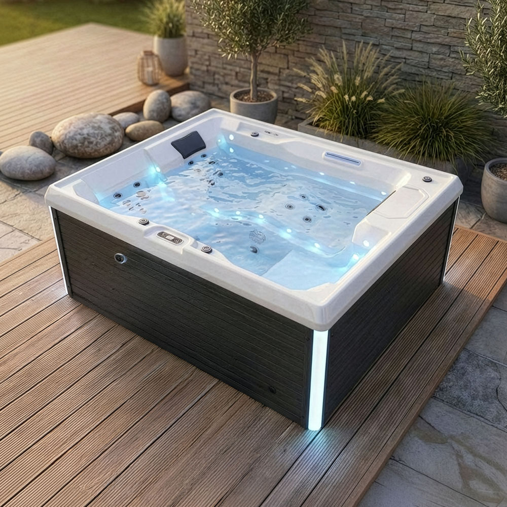 Masažni bazen Stream Pure z LED osvetlitvijo na terasi